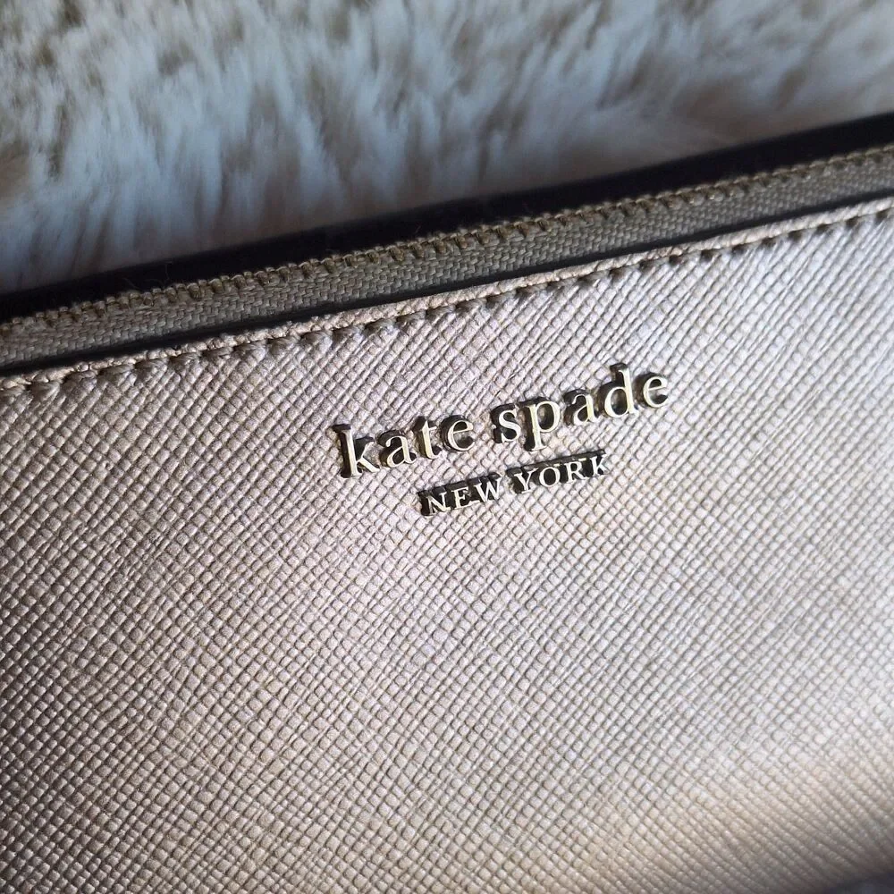 Kate Spade New York Spencer Metallic Slim Bifold Wallet Rose Gold Small Pink
